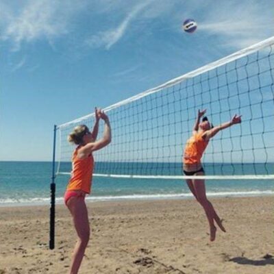 Girls playing on sand