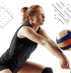 A woman is playing volleyball on the court