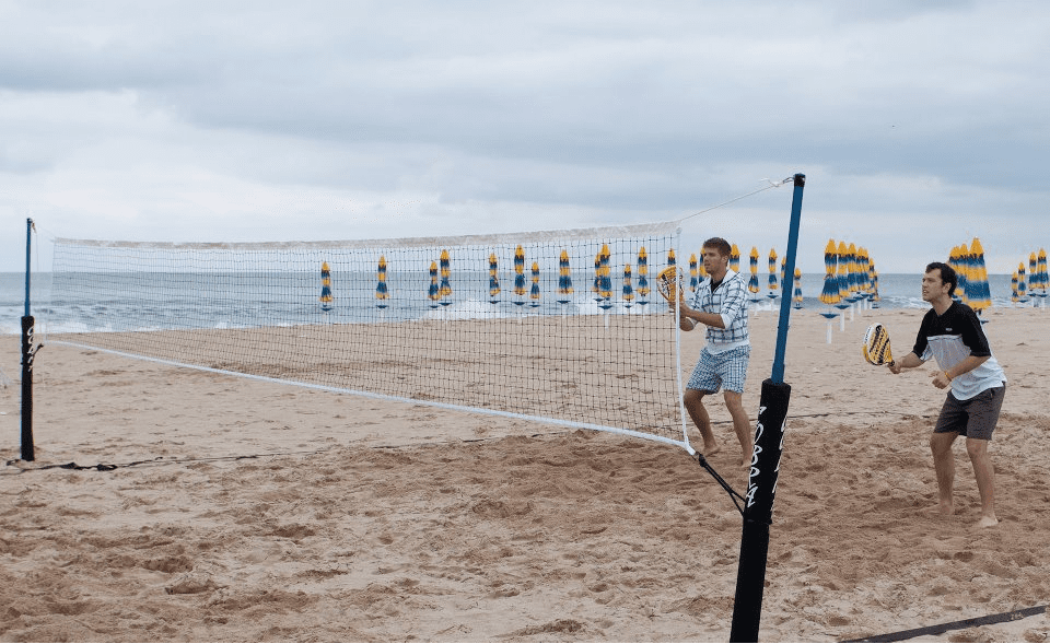 people playing beach volleyball
